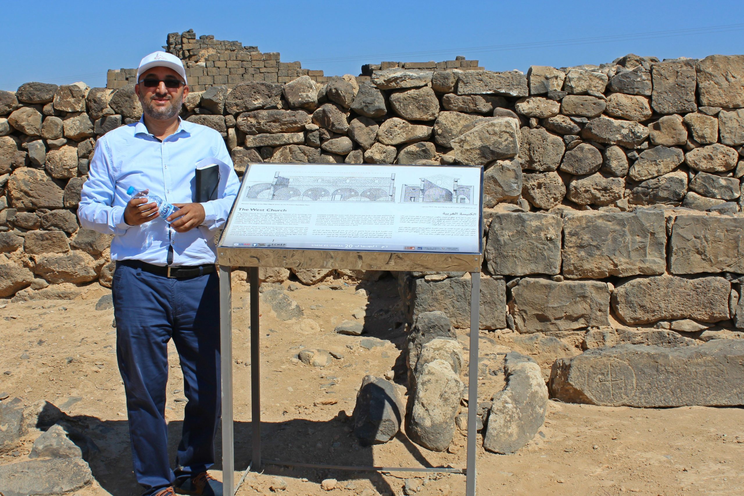 Jehad Horoun with new interpretive panels at the Umm el Jimal site near Mafraq