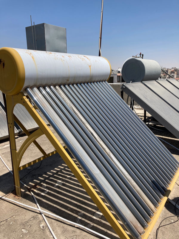 Rooftop solar water heaters on an apartment building in Amman